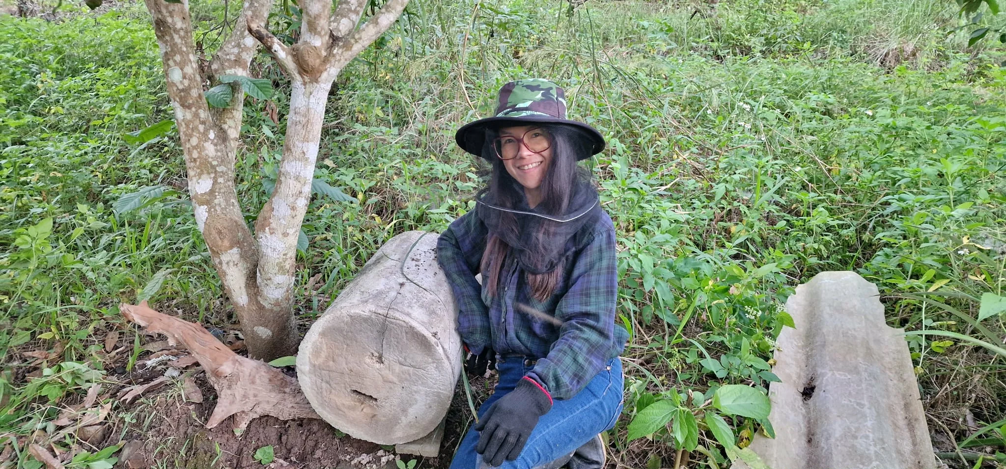 Nate working with bee houses on the farm